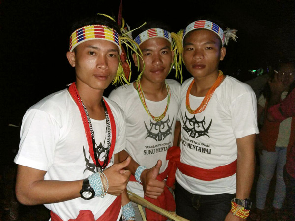 Mentawai boys proudly participating in a cultural festival in Tuapeijat